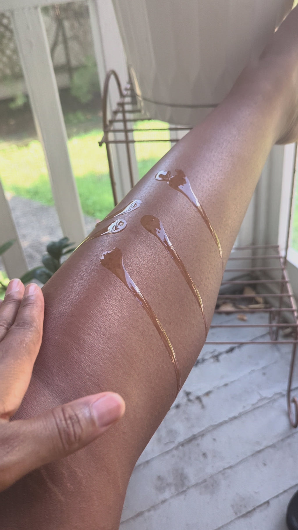 Rubbing oil into  skin